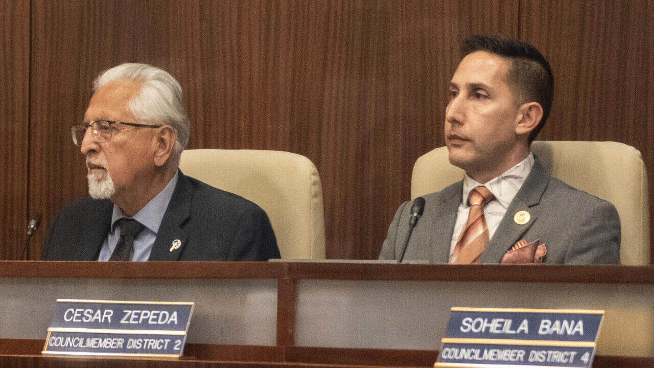 Two men at dais