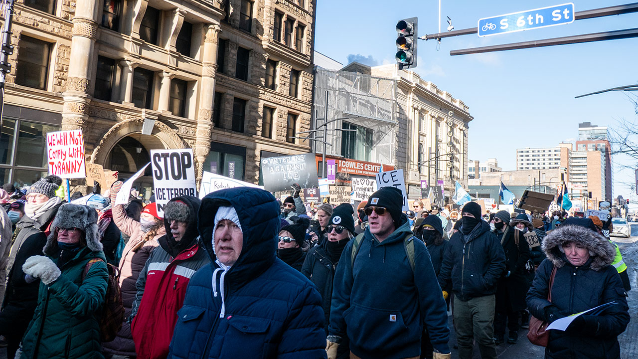 People in Minneapolis march against U.S. Immigration and Customs Enforcement on Jan. 25. (Sharon Mollerus via Flickr, CC BY 4.0)