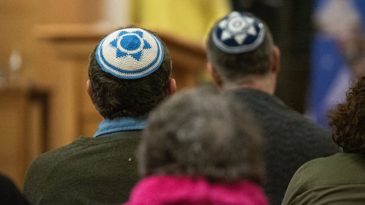 People wearing yarmulkes