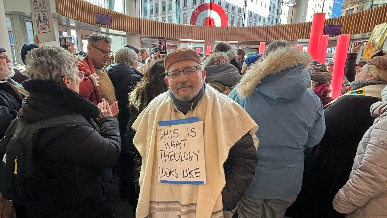 Bay Area Rabbi David Cooper protests on Jan. 23 with interfaith clergy in Minneapolis where Target’s international headquarters is located, demanding that the retailer keep federal immigration agents out of its parking lots and stores. (Courtesy)