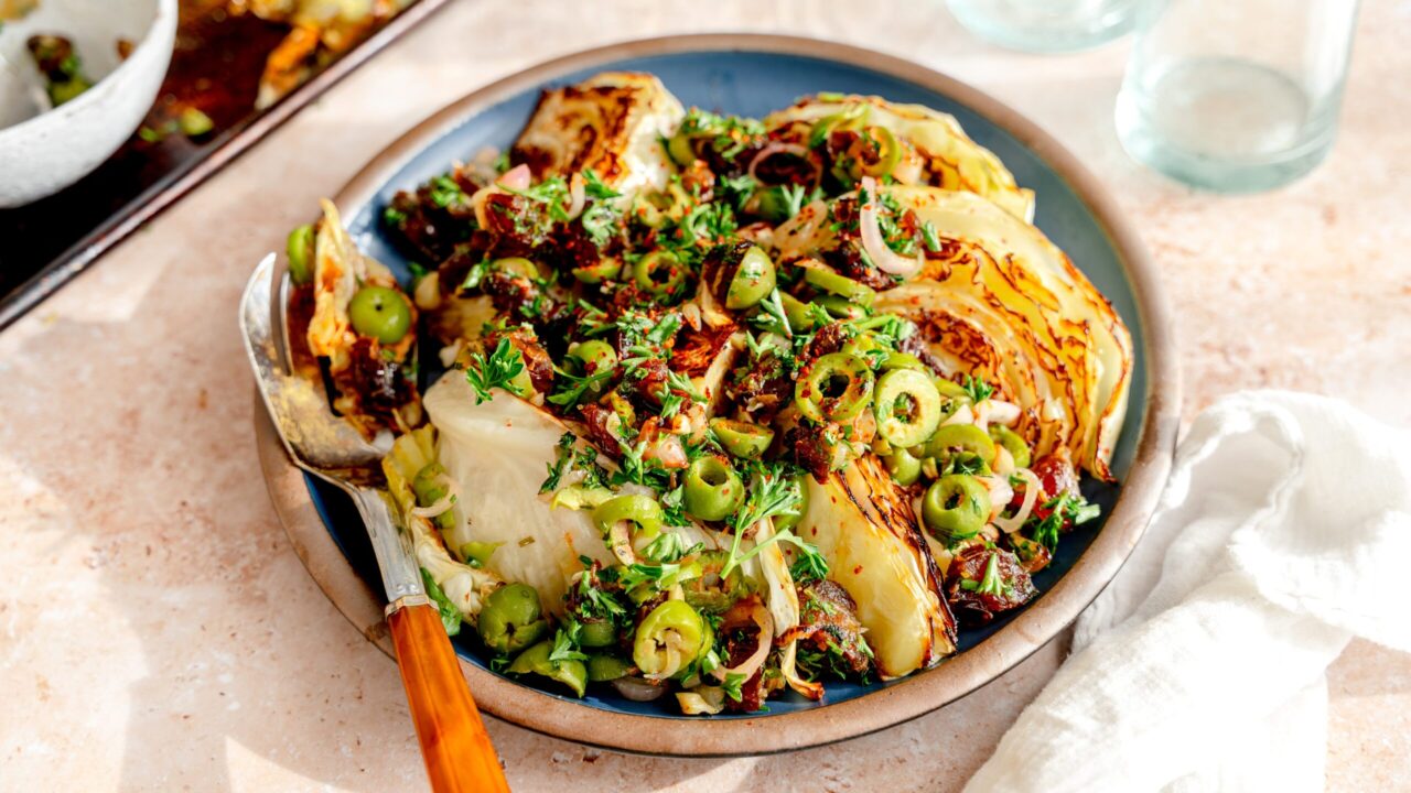 This roasted cabbage recipe includes a nod to the Seven Species with date and olive salsa. (Micah Siva)