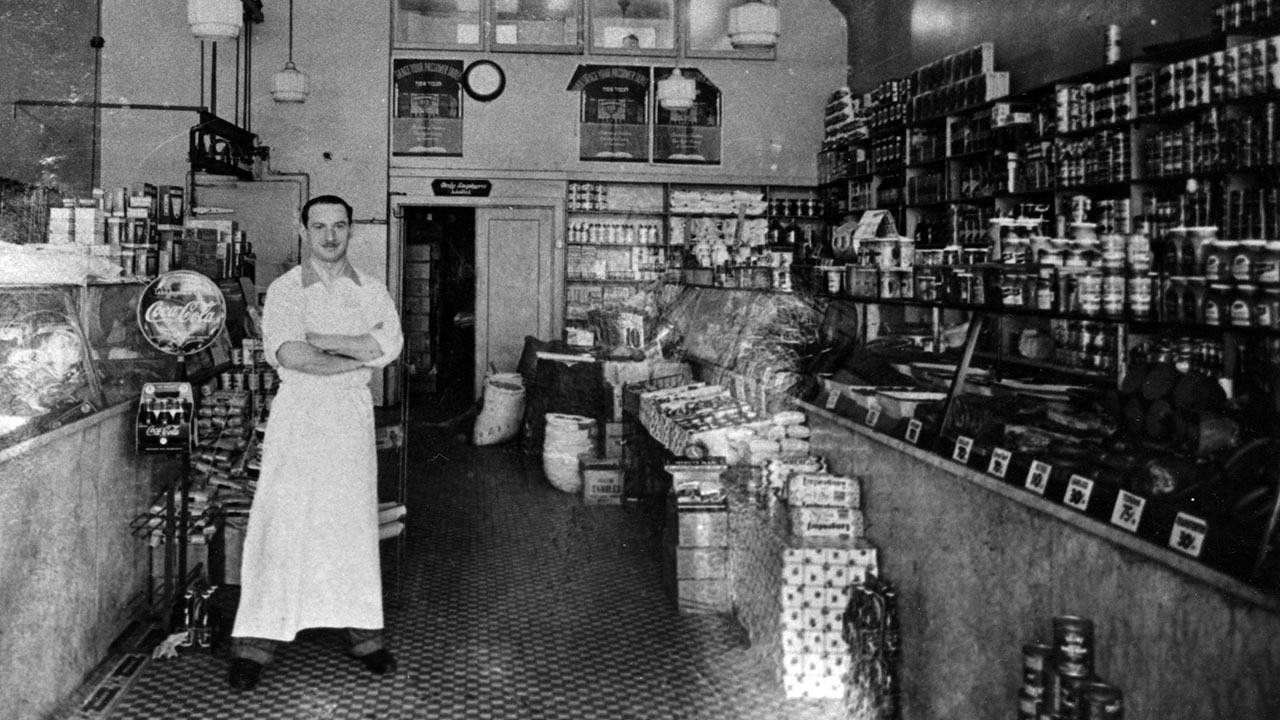 Shopkeeper Harry Diller stands inside Diller’s Kosher Restaurant in San Francisco's Fillmore District around 1940. (The Magnes Collection of Jewish Art and Life via Flickr, CC BY-NC-SA 2.0)