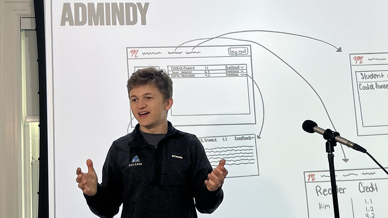 Niko Ustin, then a teenager at Hawken School, presents the learning management software he built for his high school near Cleveland, Ohio. (Courtesy)