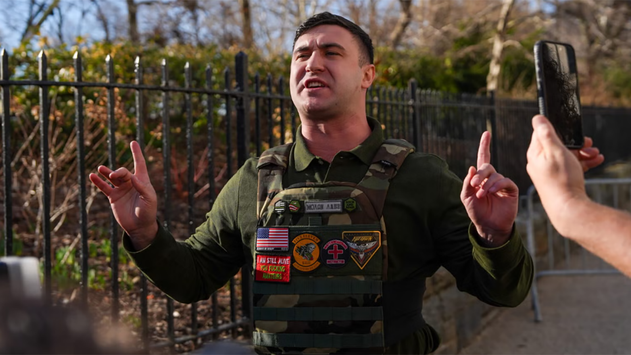 Far-right influencer Jake Lang speaks in front of Gracie Mansion regarding the attempted bombing at a protest he organized, March 9, 2026 in New York City. (Ryan Murphy/Getty Images)