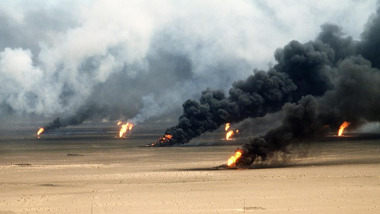 Oil wells set on  fire by Iraqi forces burned outside of Kuwait City during Operation Desert Storm in 1991. (Tech Sgt. David Mcleod via Combined Military Service Digital Photographic Files)