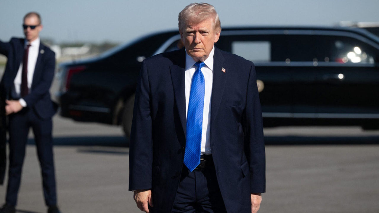 U.S. President Donald Trump speaks to reporters before boarding Air Force One at Palm Beach International Airport in West Palm Beach, Florida, on March 23, 2026. (Saul Loeb/AFP via Getty Images)