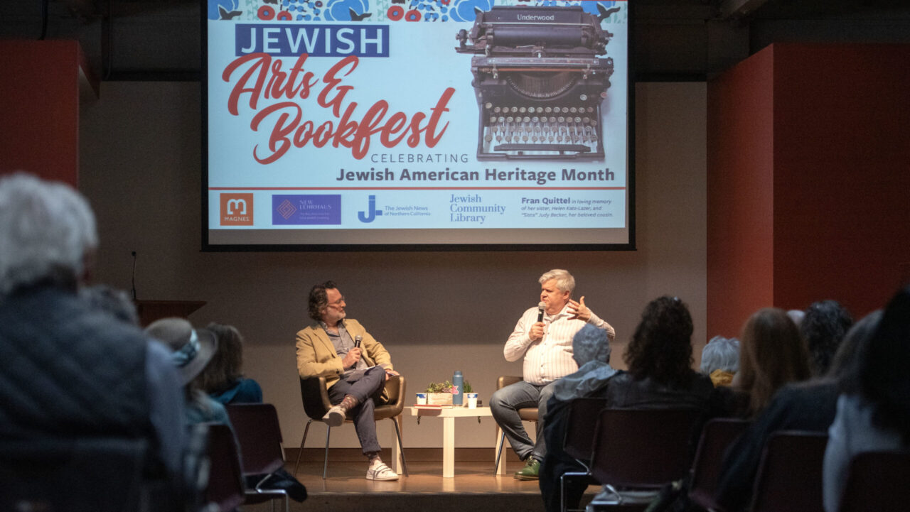 Author Daniel Handler (right),  better known as Lemony Snicket, talks about his career with J.'s then-Editor-in-Chief Chanan Tigay during the Jewish Arts & Bookfest at the Magnes in 2025. (Aaron Levy-Wolins/J. Staff)