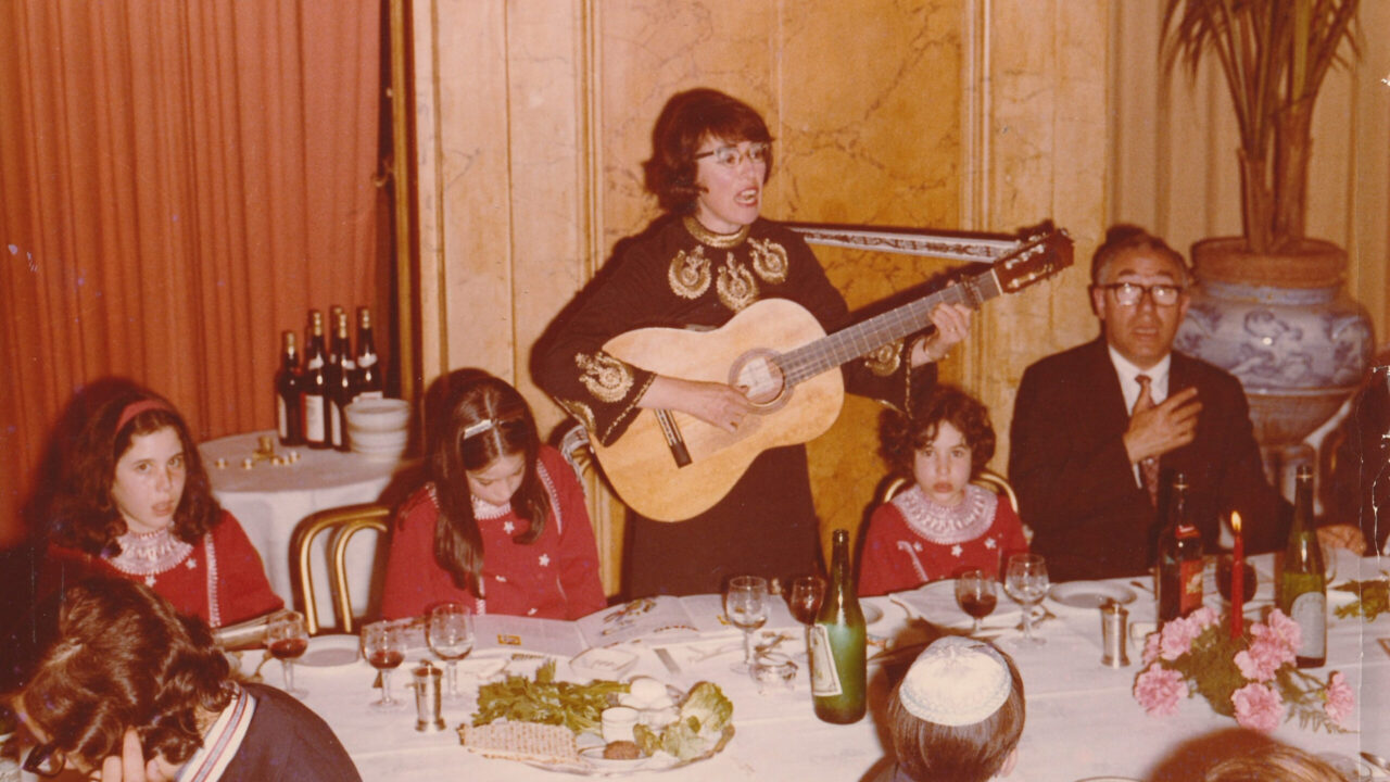 Shulamith performing at a Seder in Rome, Italy, 1971. Left to Right: Rachel Neiman, Rina Neiman, Shulamith Dubno Neiman, Becky Neiman, David Neiman. (Courtesy Rina Neiman)