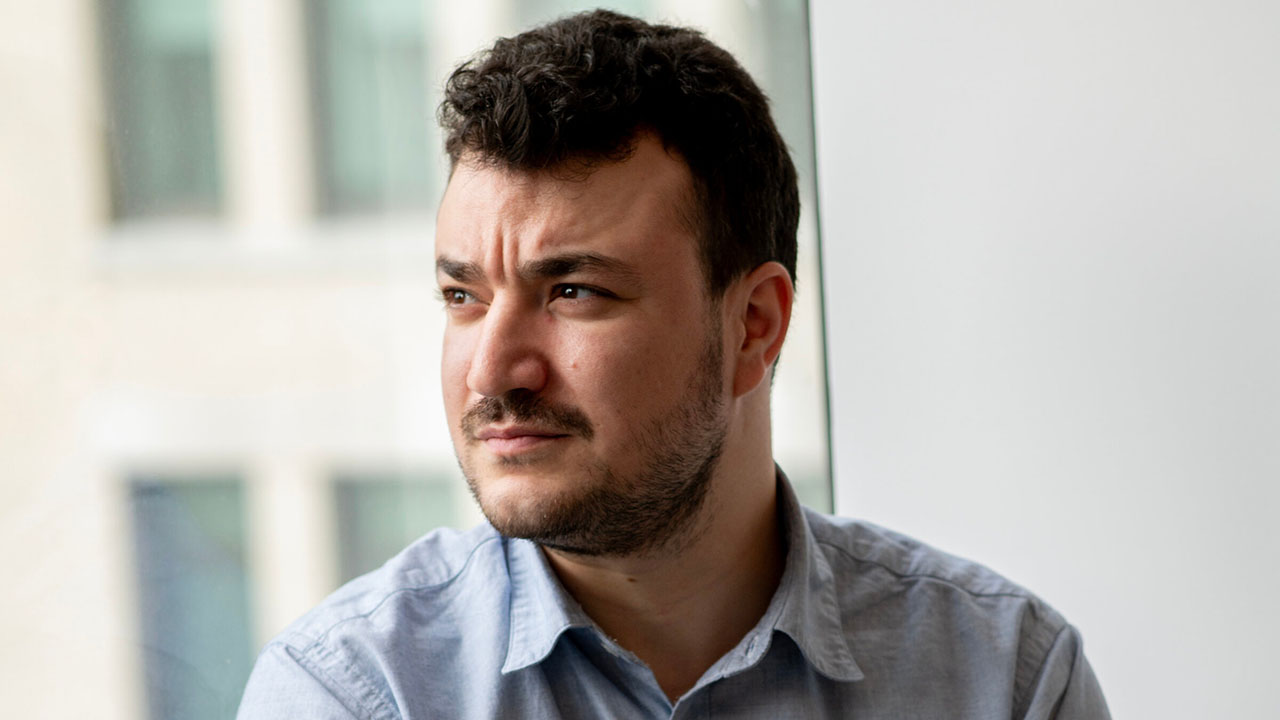 Mahmoud Khalil, who was targeted by the Trump administration for his participation in protests against Israel at Columbia University, poses for a portrait at the New York Civil Liberties Union offices in Manhattan. (Melanie Einzig for the Forward)