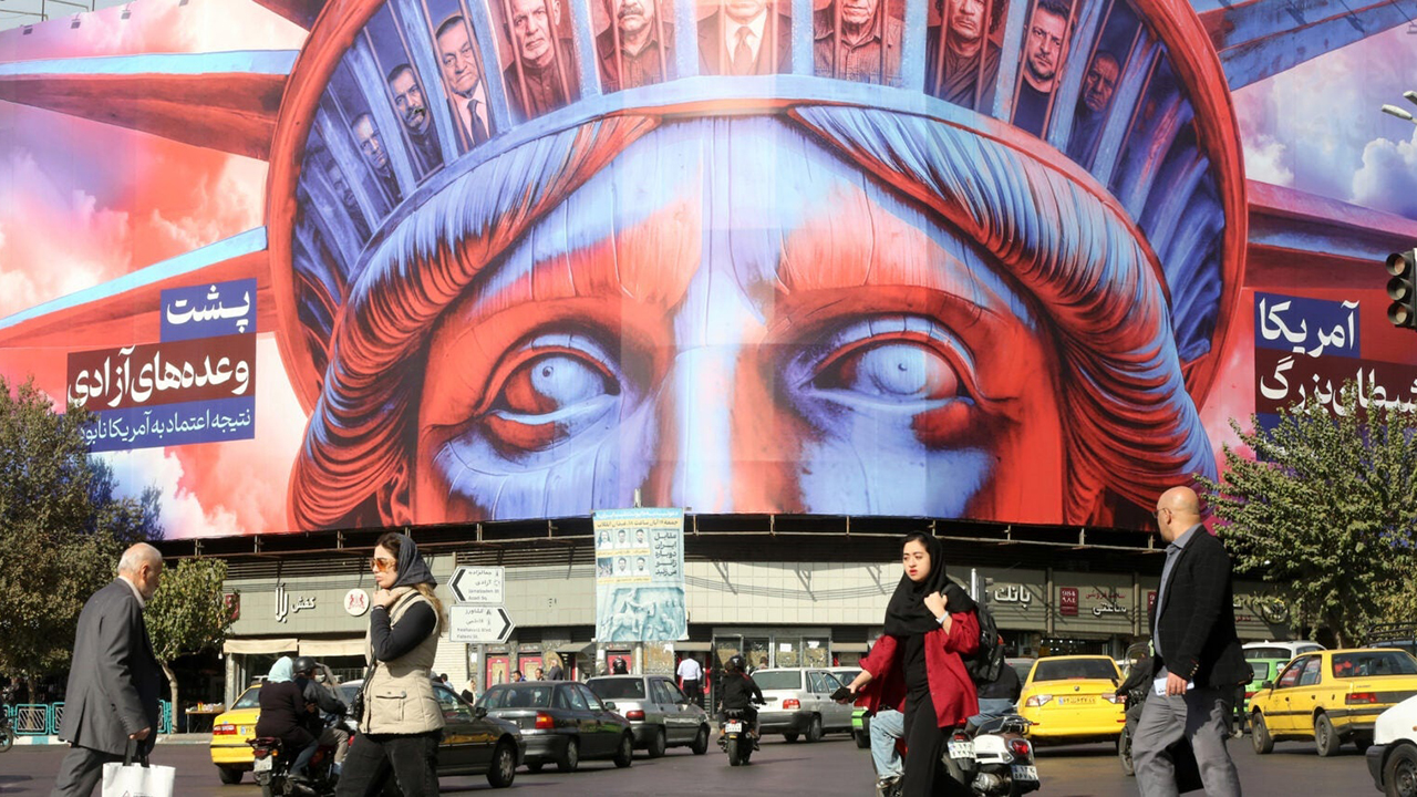 A poster is hung in Tehran's Revolution Square featuring an image of the Statue of Liberty, and photographs of several heads of state to mark the 46th anniversary of the U.S. Embassy takeover and hostage crisis in Tehranon Nov. 5, 2025. (Fatemeh Bahrami/Anadolu via Getty Images)