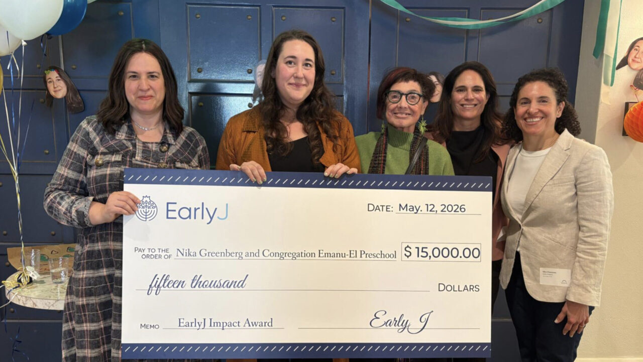 Nika Greenberg (second from left) receiving the Early J Impact Award. (Courtesy)