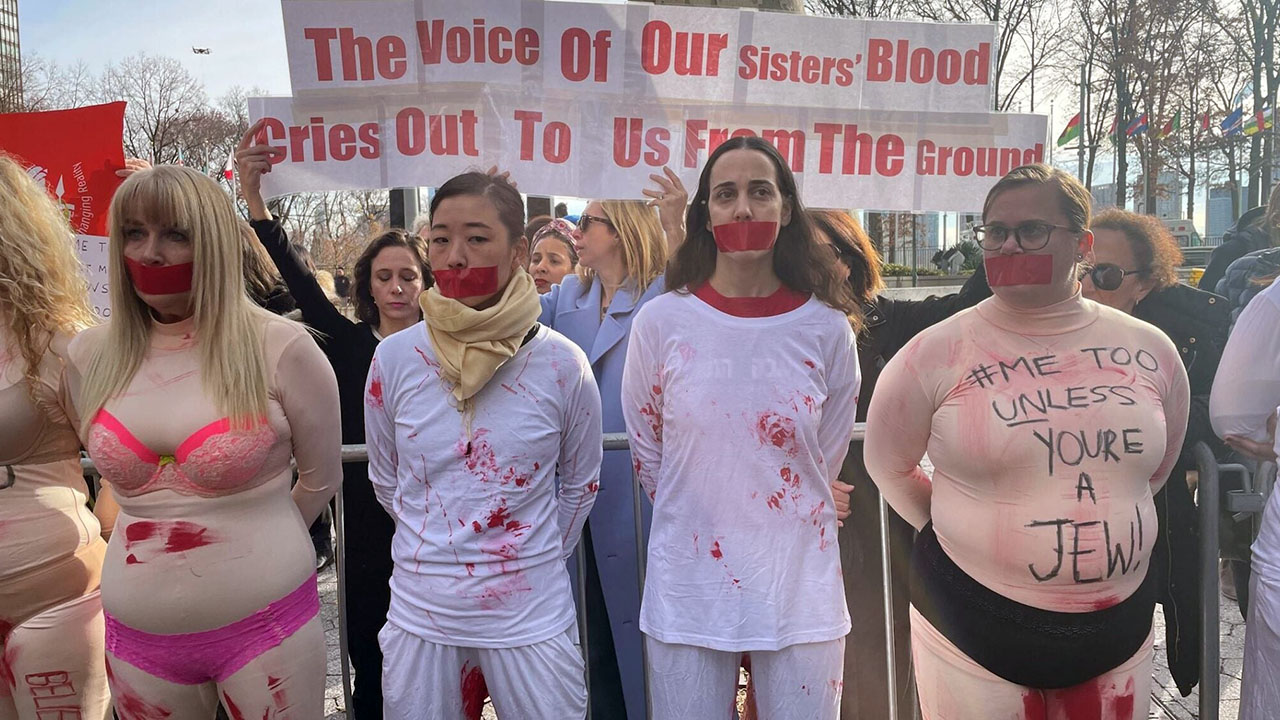 Protesters outside the United Nations on Dec. 4, 2023, call for condemnation of sexual violence perpetrated against Israeli women. (Luke Tress)