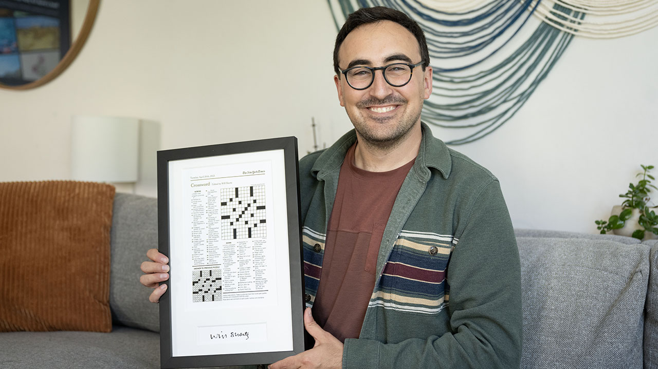 Crossword constructor Adam Wagner holds his first puzzle published in the New York Times. (Aaron Levy-Wolins/J. Staff)