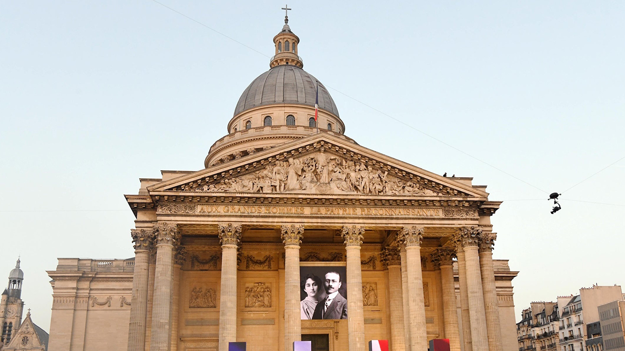 A portrait of the late historian and resistance fighter Marc Bloch adorns the facade of the Pantheon before his induction ceremony along with his wife Simonne Vidal in Paris, France, June 23, 2026. (Li Yang/China News Service/VCG via Getty Images)