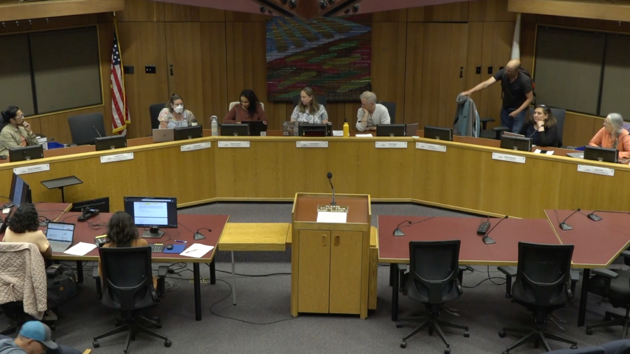 Amir Kol (third from right) gets up to leave the Davis Human Relations Commission meeting after announcing his resignation on May 28. (Screenshot via YouTube/City of Davis)