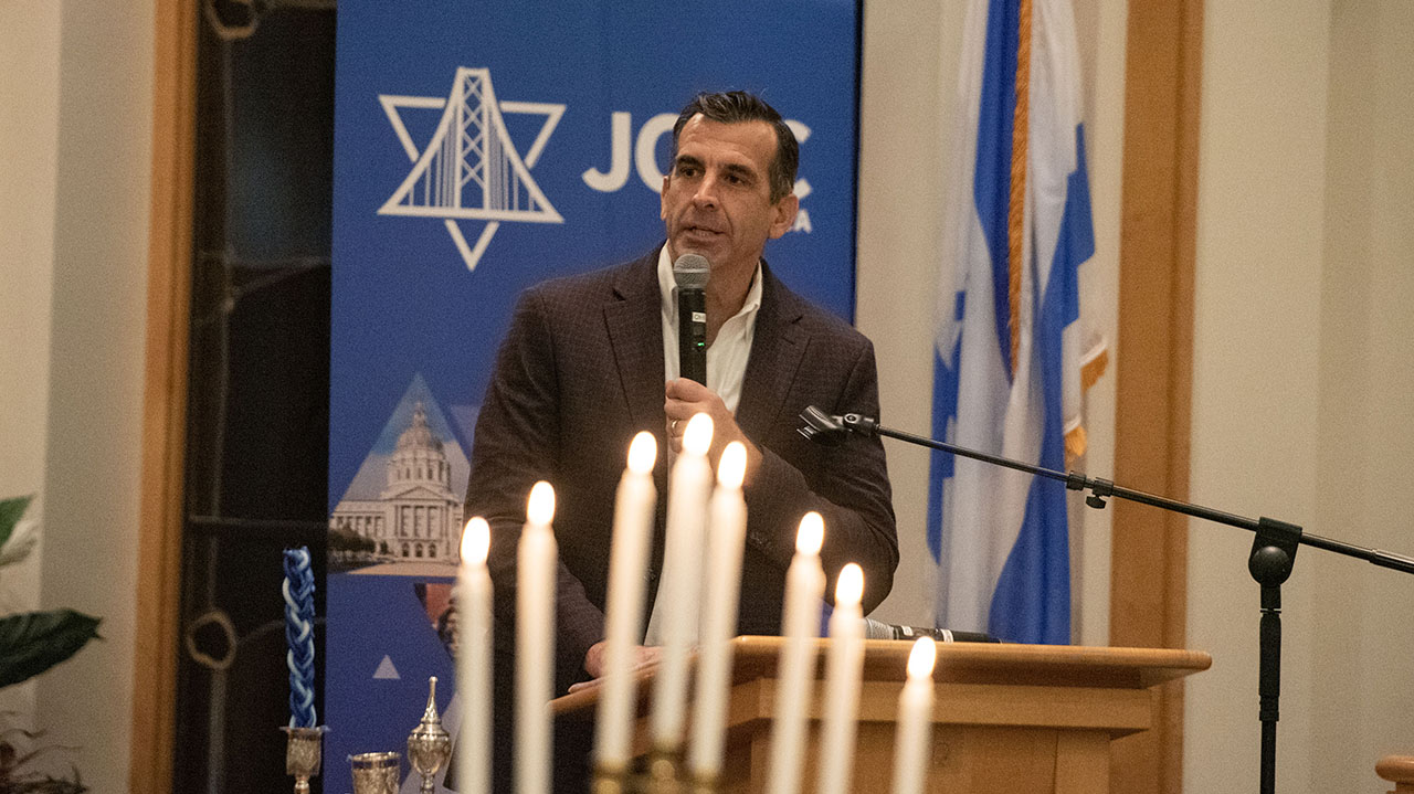 Rep. Sam Liccardo (D-San Jose), seen here during a Hanukkah gathering  at Congregation Shir Hadash in Los Gatos in 2025, voted against the amendment to end aid to Israel, saying it was too poorly drafted. (Aaron Levy-Wolins/J. Staff)