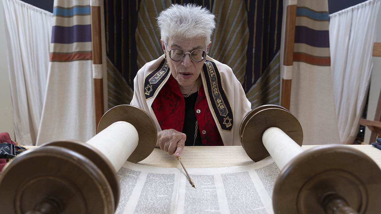 Judith Hauptman practices reading from the Torah the day before her bat mitzvah in June. (Courtesy Misha Bruk)