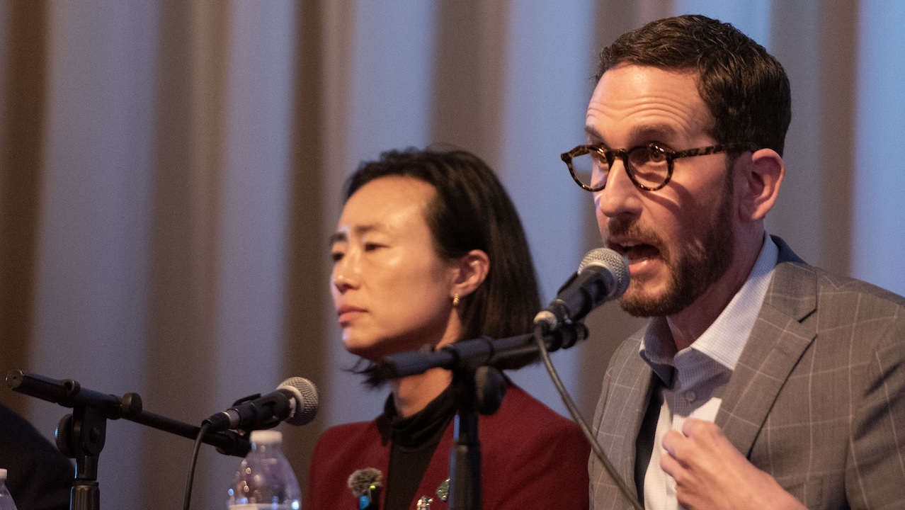 S.F. District 1 Supervisor Connie Chan (center) looks on as Calif. state Sen. Scott Wiener (D-SF) speaks during the San Francisco Independent Media Coalition’s congressional candidate forum at the United Irish Cultural Center in San Francisco, Calif., on Wednesday, April 15, 2026. (Aaron Levy-Wolins/J. Staff)