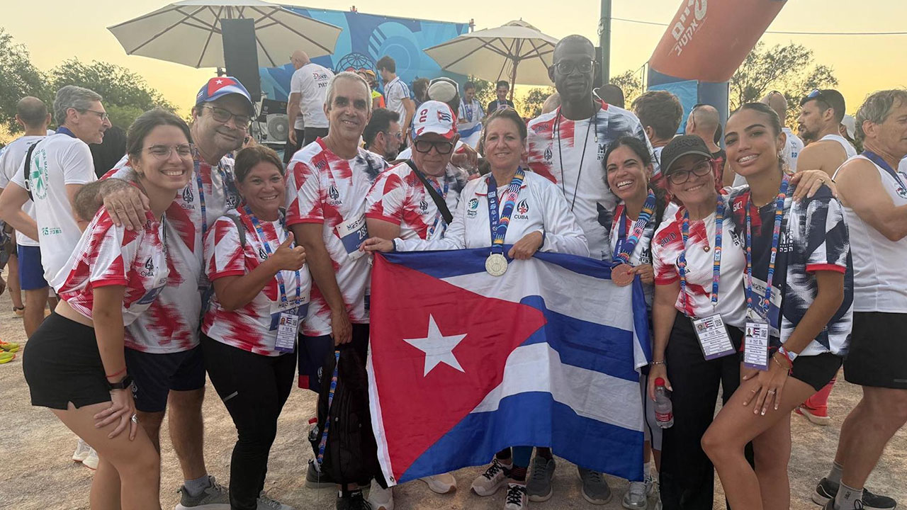 Hella Eskenazi (center) poses with the Cuban delegation for the Maccabiah Games in Israel. (Courtesy Hella Eskenazi)