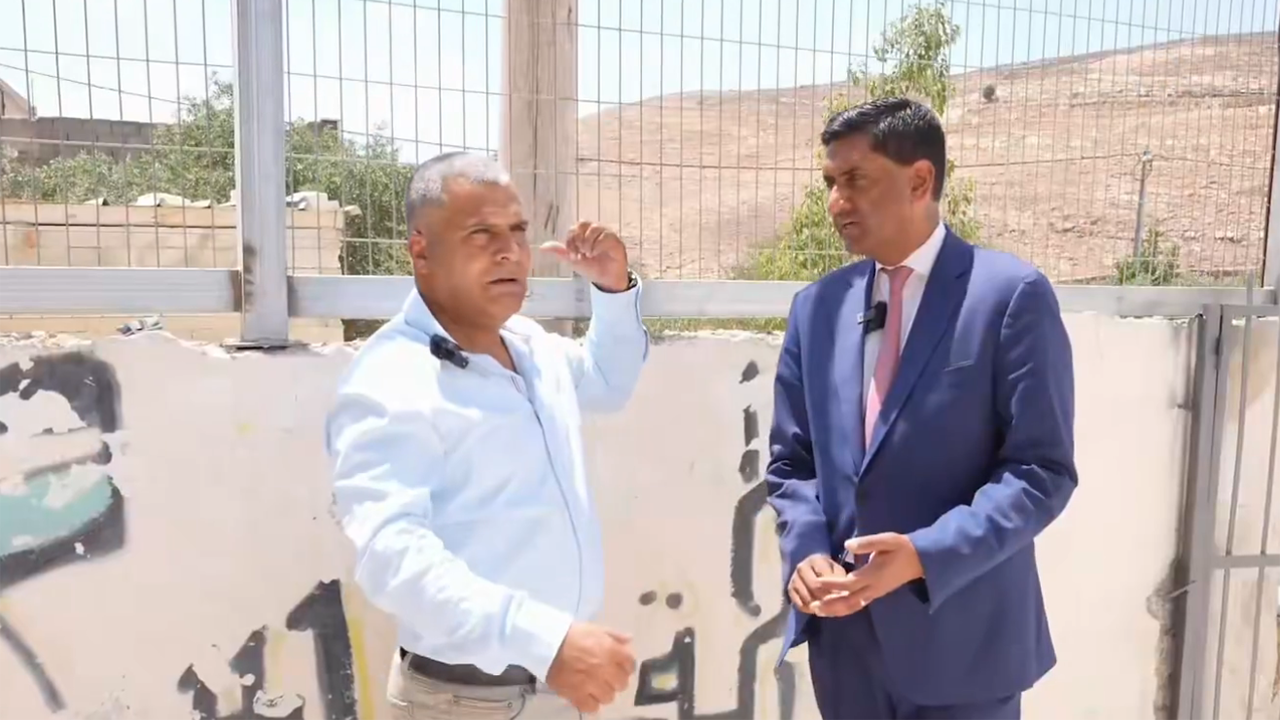 Rep. Ro Khanna (right) on his July visit to the West Bank. (Screenshot via X.com)